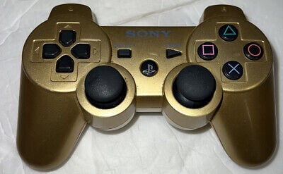 Manette sans fil Dualshock 3 - Or (Retro Fam)