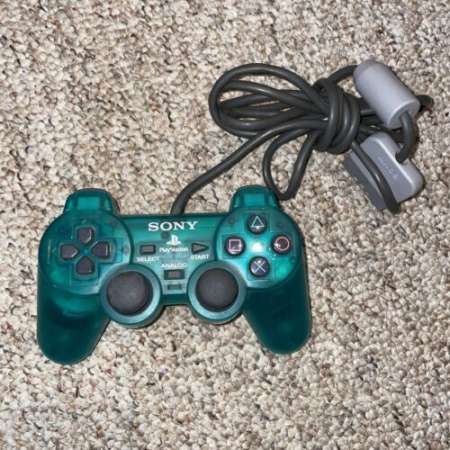 Mando Dual Shock original de PS1 color verde transparente (Retro Fam)